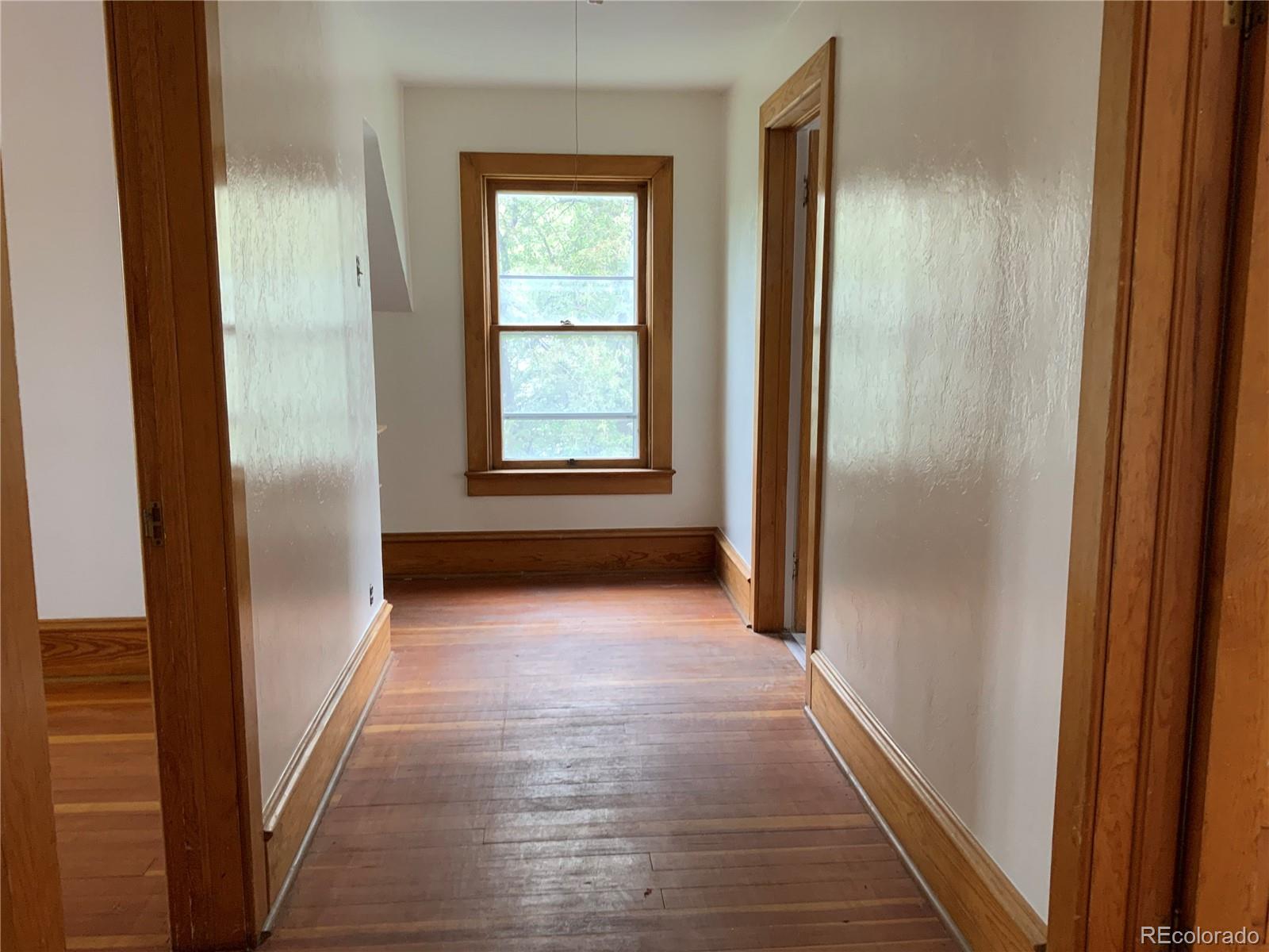 1011 Main Street Meeker, CO 81641 - Photo 28 of 28 a view of hallway with windows and entryway