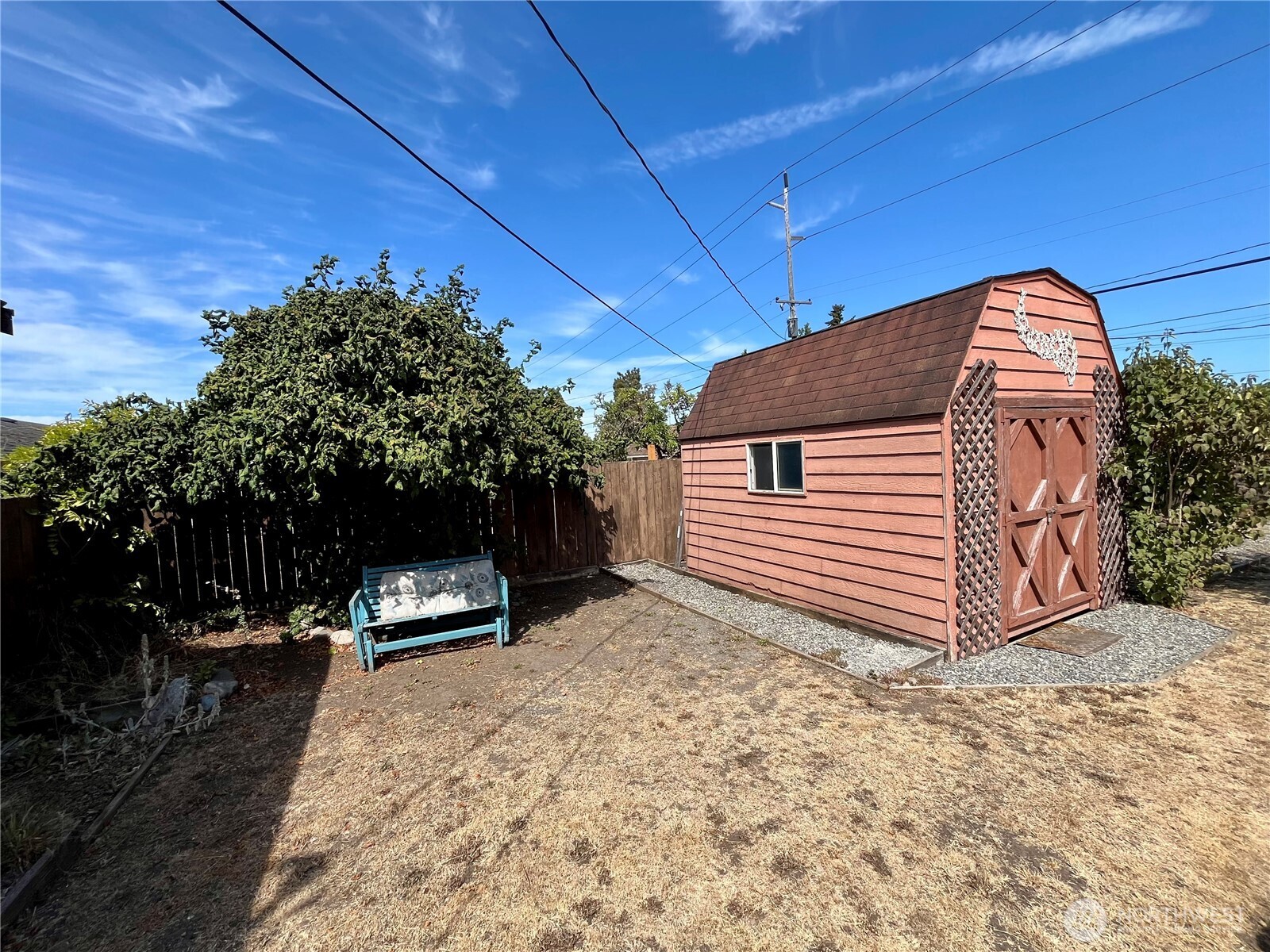 220 North Govan Avenue Sequim, WA 98382 - Photo 24 of 29 a view of a backyard with sitting area