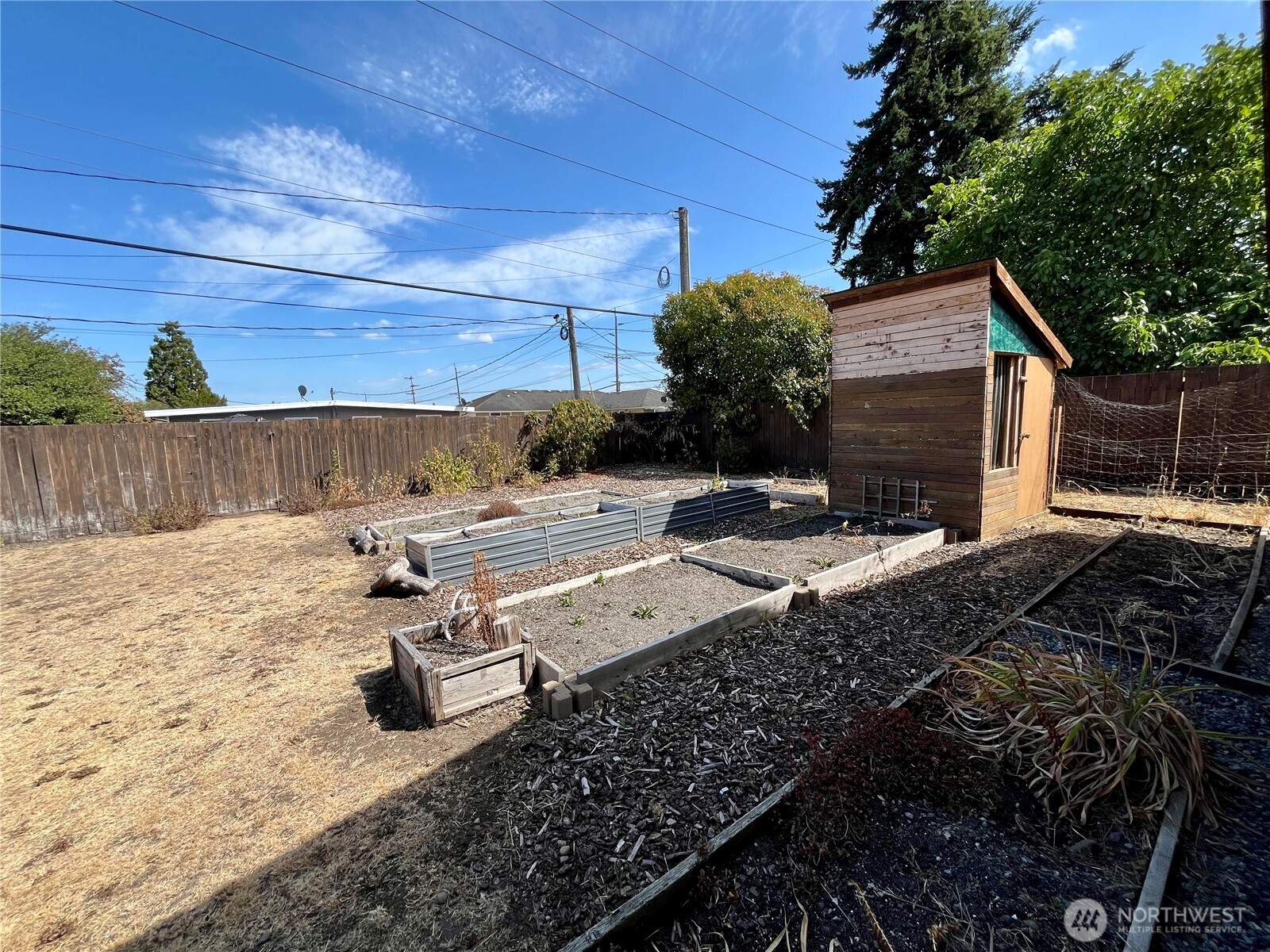 220 North Govan Avenue Sequim, WA 98382 - Photo 25 of 29 a view of a backyard with sitting area