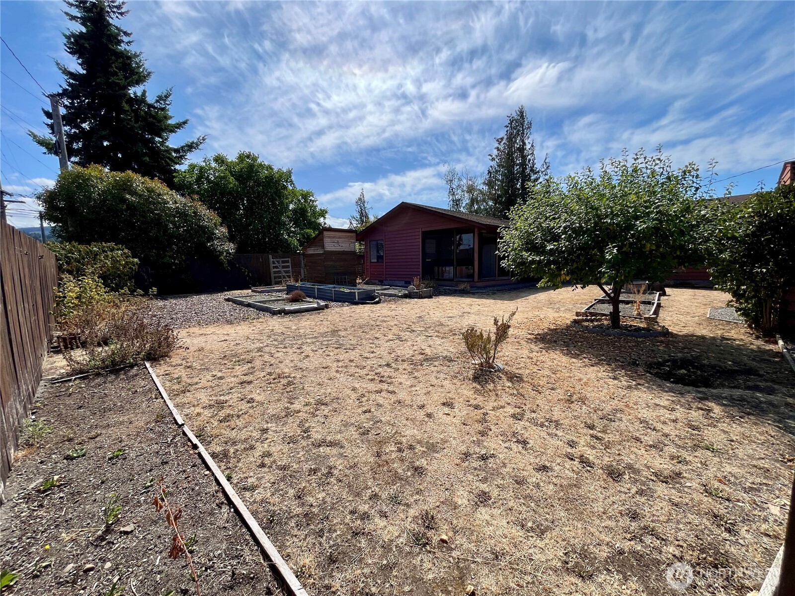 220 North Govan Avenue Sequim, WA 98382 - Photo 26 of 29 a view of a backyard of the house