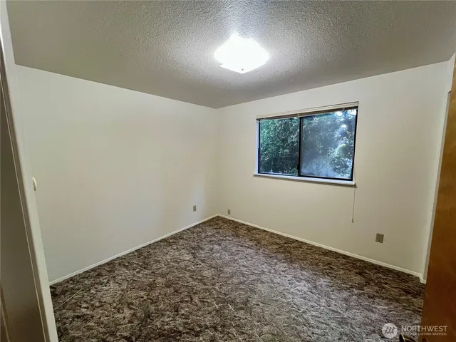 an empty room with a workbench