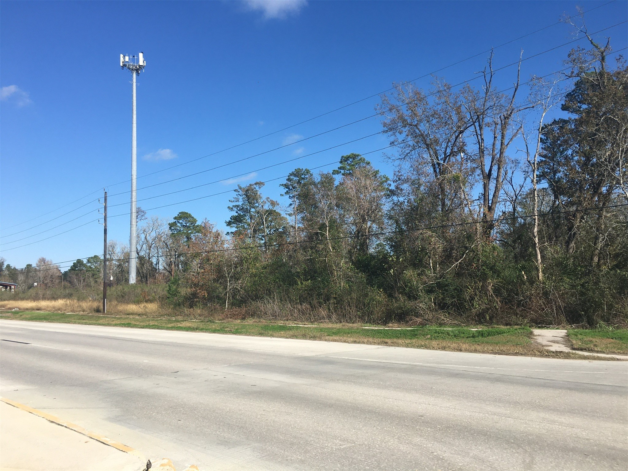 22332 Crosby Huffman Road Huffman, TX 77336 - Photo 3 of 12 a view of a building with a trees