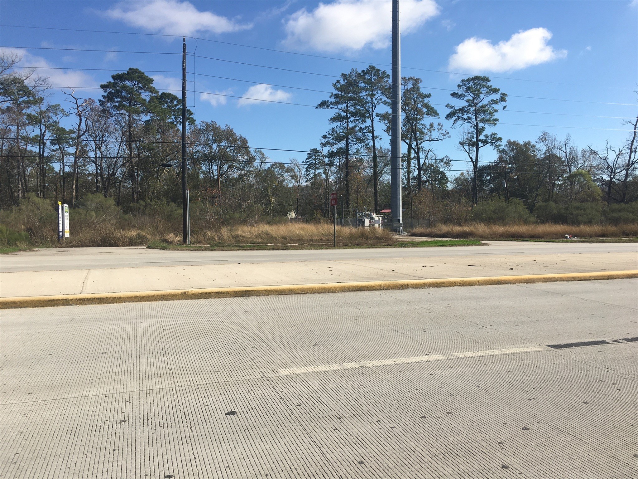 22332 Crosby Huffman Road Huffman, TX 77336 - Photo 7 of 12 a view of a building with a yard