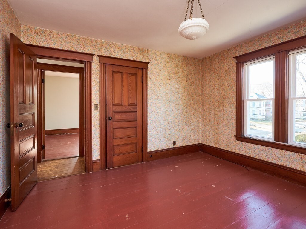 32 Wayne Street Worcester, MA 01603 - Photo 20 of 35 an empty room with windows and closet