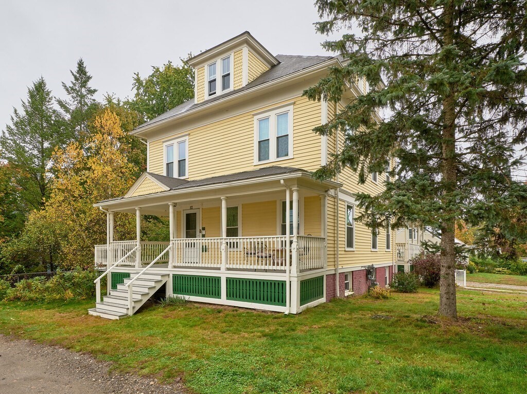32 Wayne Street Worcester, MA 01603 - Photo 2 of 35 a view of a house with a backyard porch and sitting area