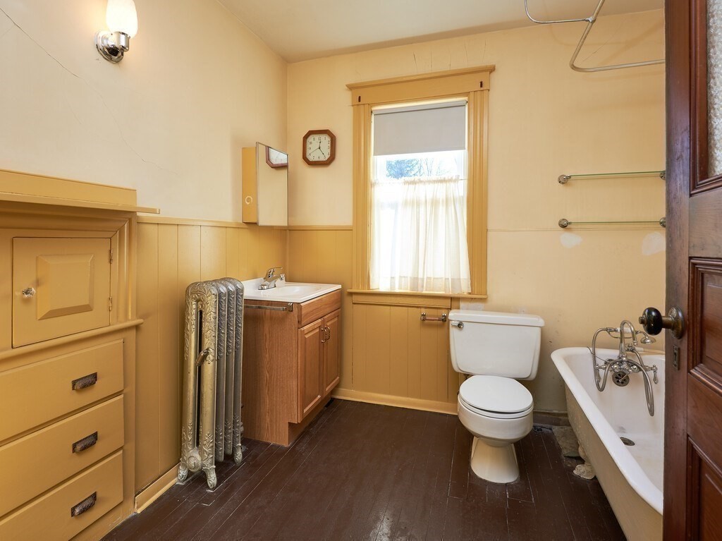 32 Wayne Street Worcester, MA 01603 - Photo 29 of 35 a bathroom with a toilet sink and tub
