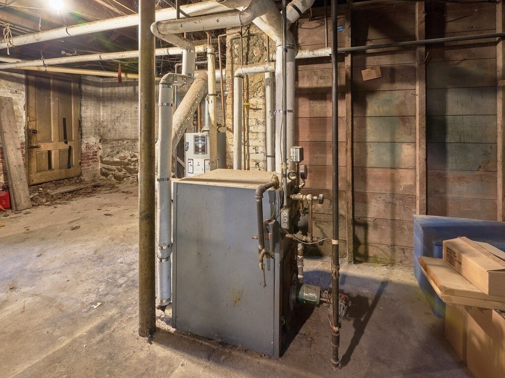 32 Wayne Street Worcester, MA 01603 - Photo 31 of 35 a bathroom with a shower and a sink