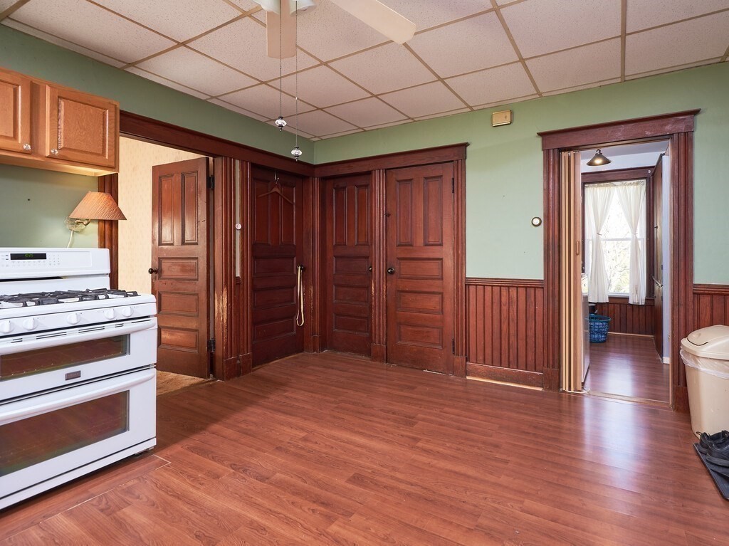 32 Wayne Street Worcester, MA 01603 - Photo 6 of 35 a view of a livingroom with an empty space and wooden floor