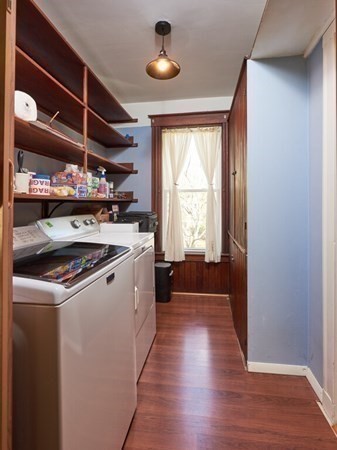 32 Wayne Street Worcester, MA 01603 - Photo 10 of 35 a view of a kitchen with wooden floor and stainless steel appliances