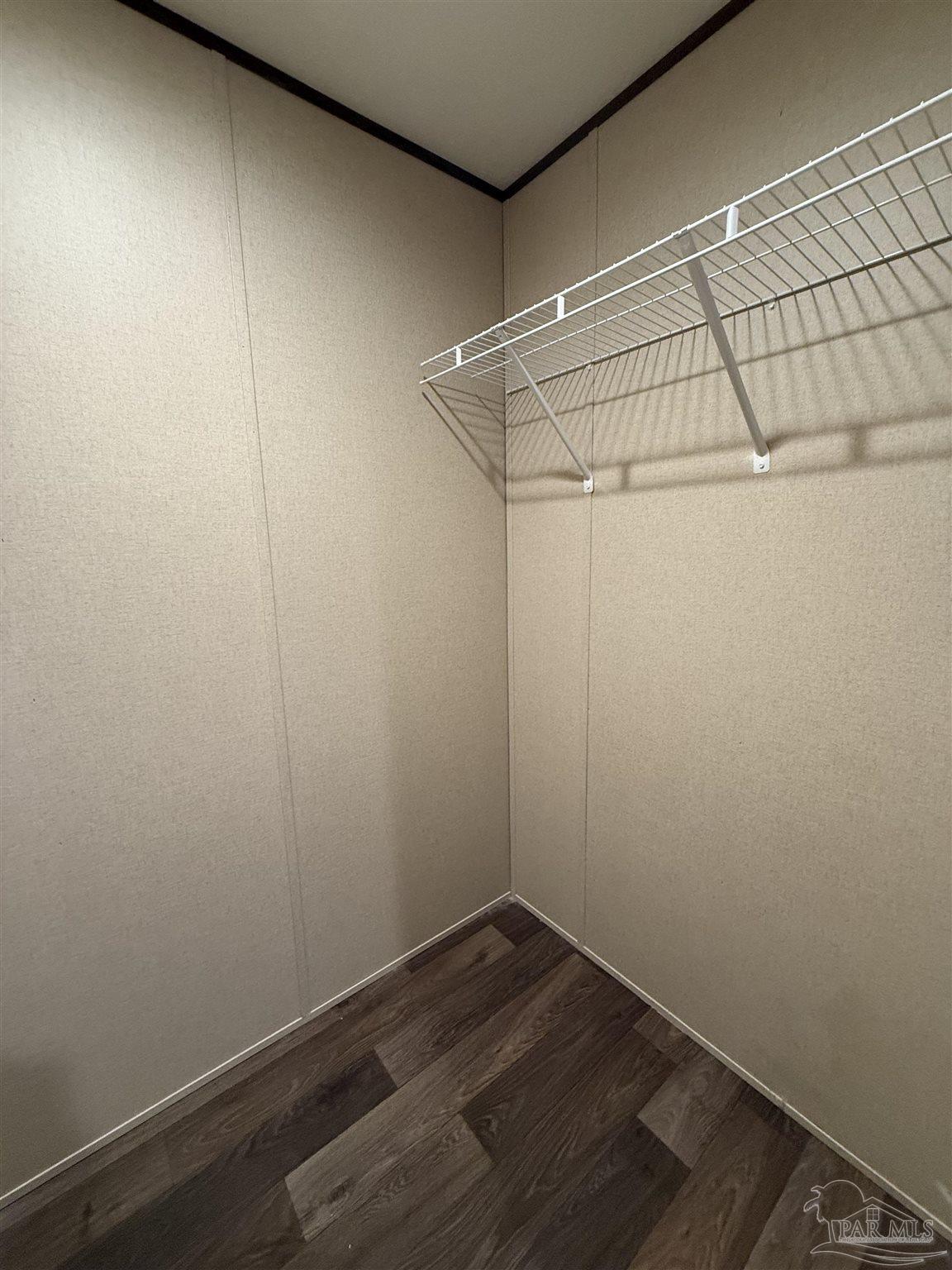 4460 Custer Lane Jay, FL 32565 - Photo 9 of 16 a view of a room with wooden floor