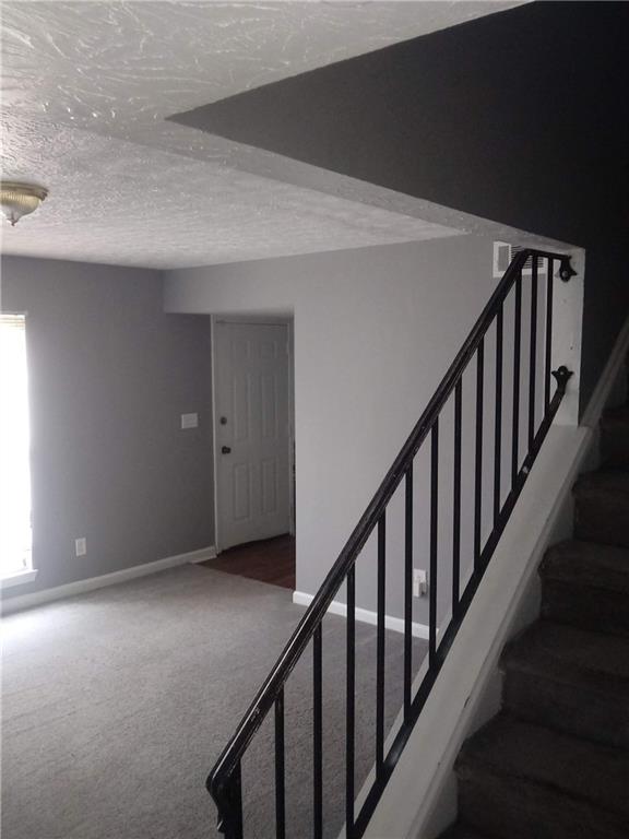 3148 Nectarine Circle Decatur, GA 30034 - Photo 10 of 10 a view of an empty room with stairs