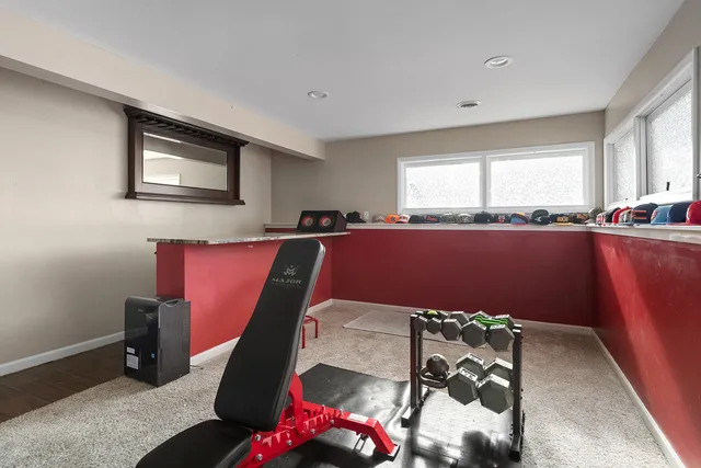 a bathroom with a sink toilet and a mirror