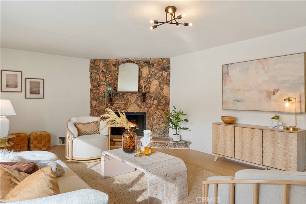 931 Camino Ramon Danville, CA 94526 - Photo 24 of 67 a living room with furniture and a fireplace