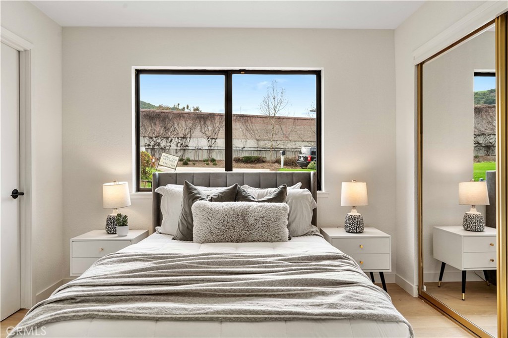 931 Camino Ramon Danville, CA 94526 - Photo 37 of 67 a spacious bedroom with a bed and a large window