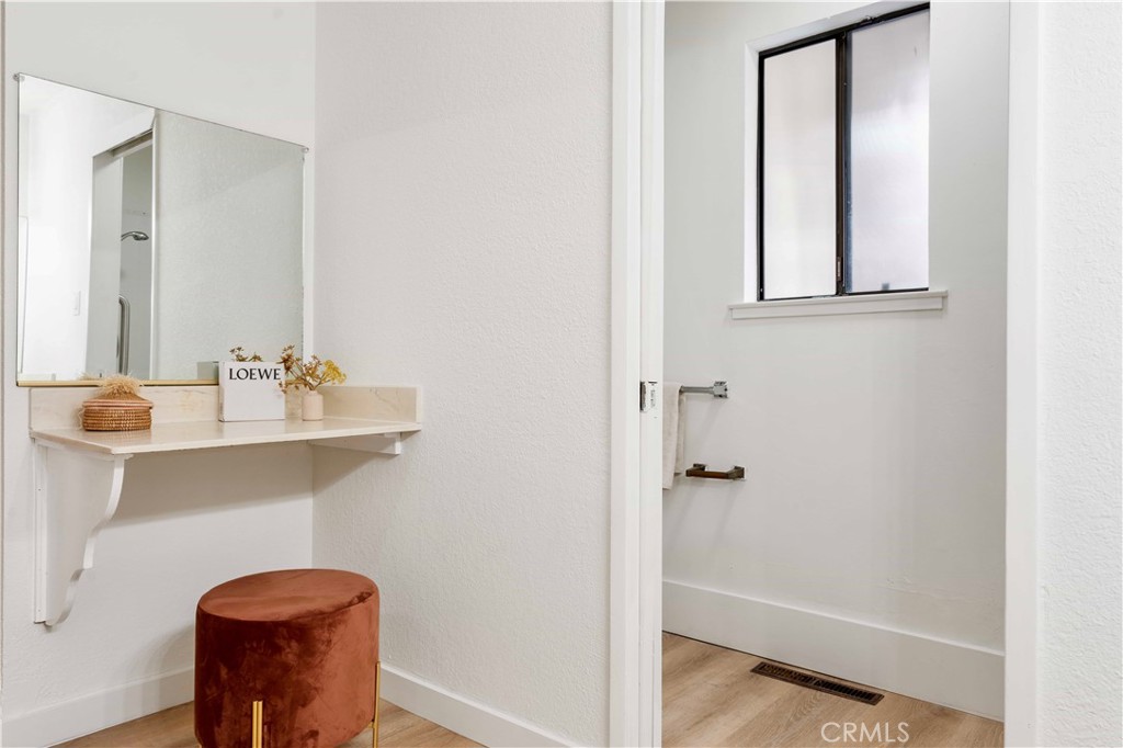 931 Camino Ramon Danville, CA 94526 - Photo 47 of 67 a bathroom with a sink a mirror and a window