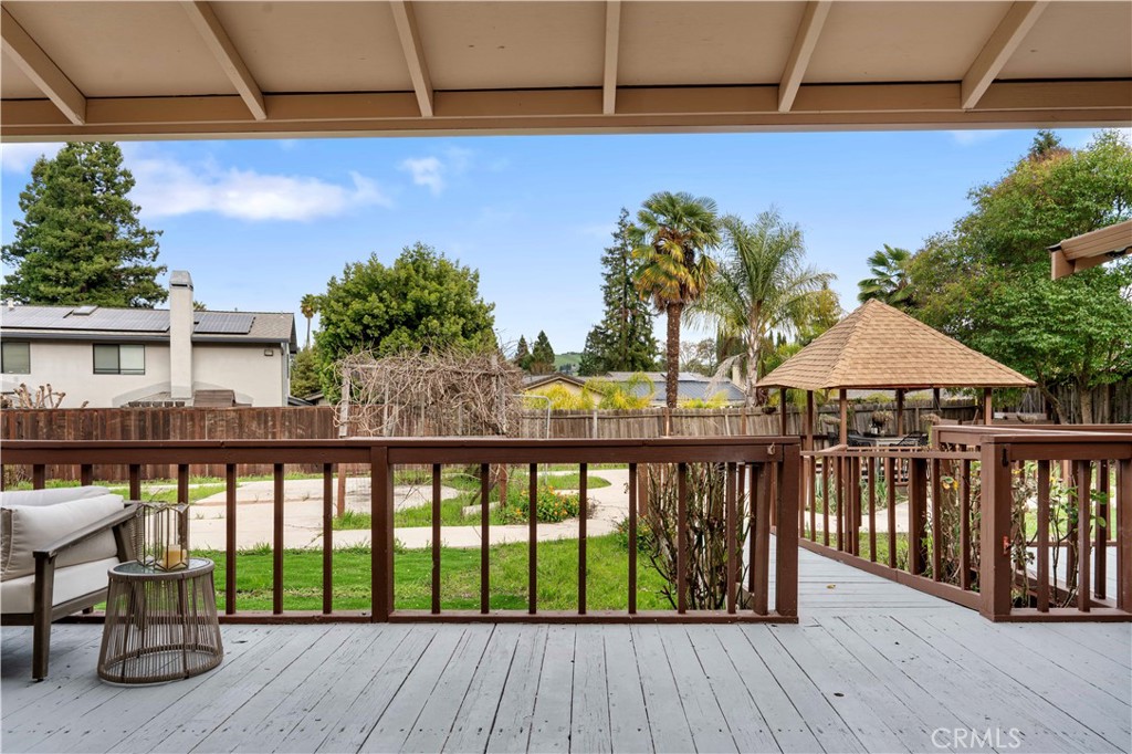 931 Camino Ramon Danville, CA 94526 - Photo 54 of 67 a balcony with wooden floor table and chairs