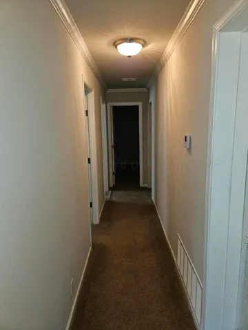 a room with cabinets and a window