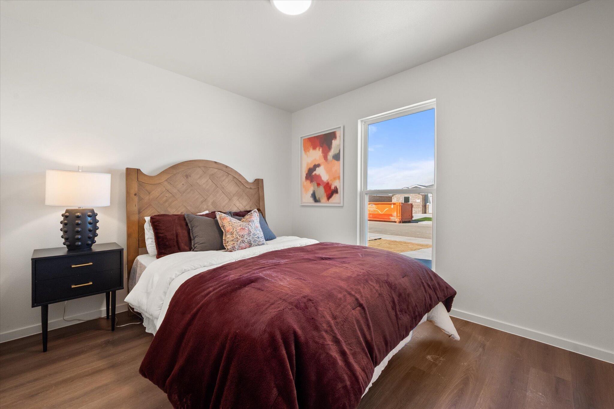 5505 Smith Street Lubbock, TX 79416 - Photo 13 of 18 a bedroom with a bed and a closet