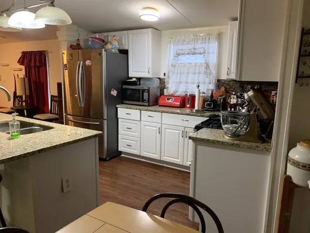 a view of a dining room with furniture