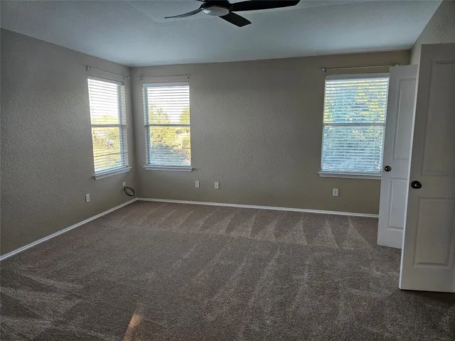 an empty room that has a window