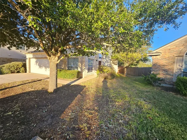 a view of yard with trees