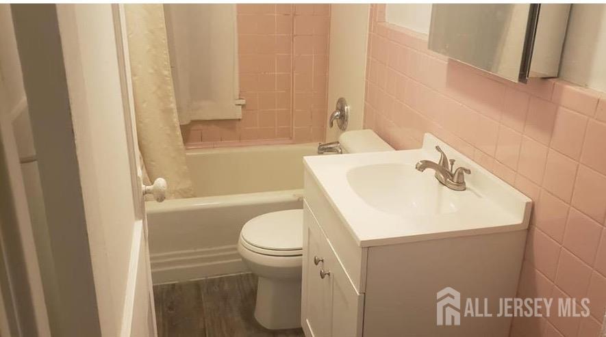 417 B Chestnut Street Middlesex, NJ 08846 - Photo 9 of 9 a bathroom with a sink and a toilet