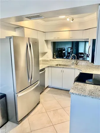$5,000 | 157 Wading Bird Circle, Unit K104, Naples, FL 34110