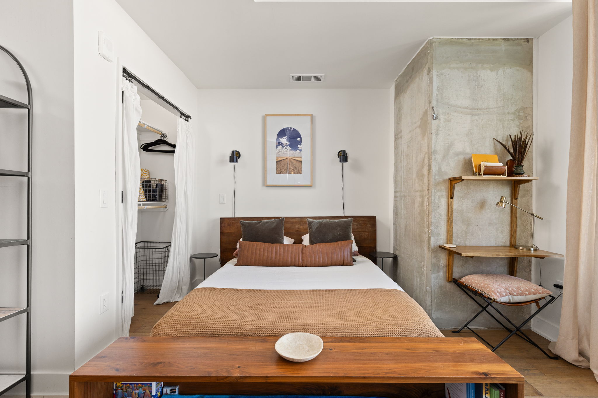 48 East Avenue, Unit 2002 Austin, TX 78701 - Photo 11 of 38 Bedroom with wood finished floors and baseboards