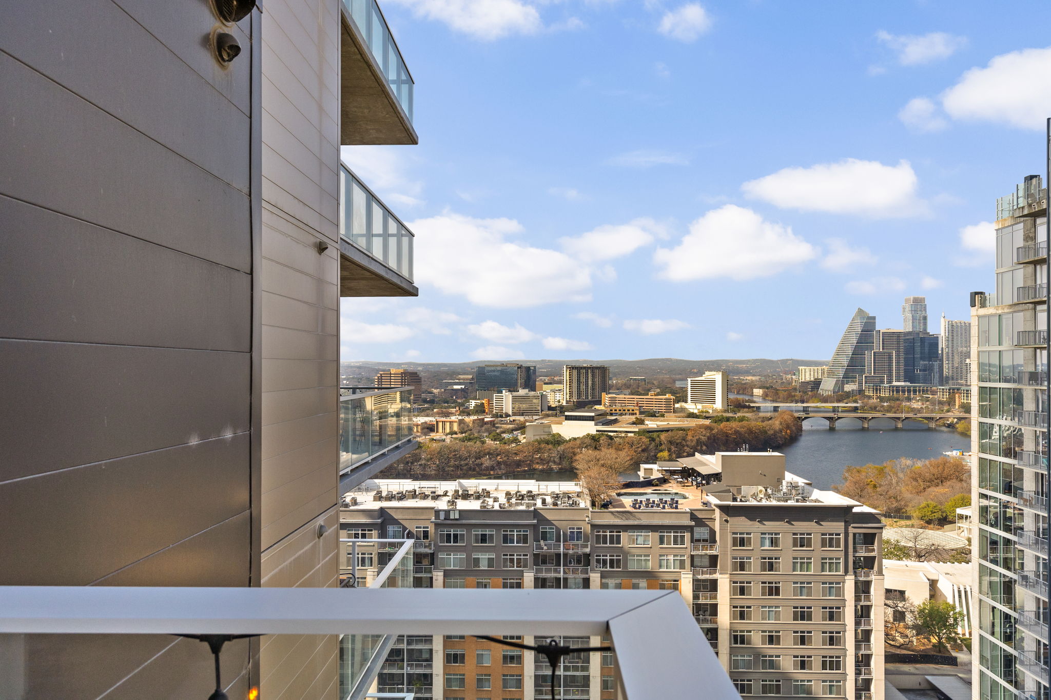 48 East Avenue, Unit 2002 Austin, TX 78701 - Photo 16 of 38 City view featuring a notable bridge and a large body of water