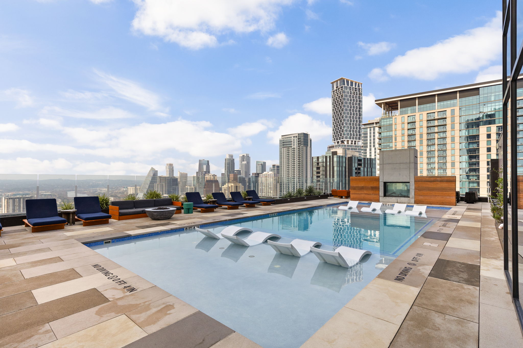 48 East Avenue, Unit 2002 Austin, TX 78701 - Photo 17 of 38 Community pool with a patio area and a skyline view