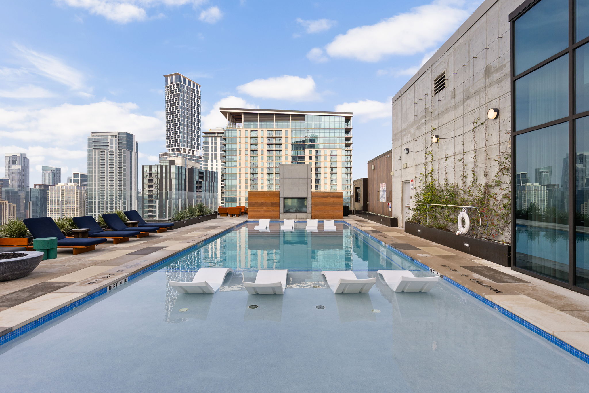 48 East Avenue, Unit 2002 Austin, TX 78701 - Photo 18 of 38 Community pool with a skyline view and a patio area
