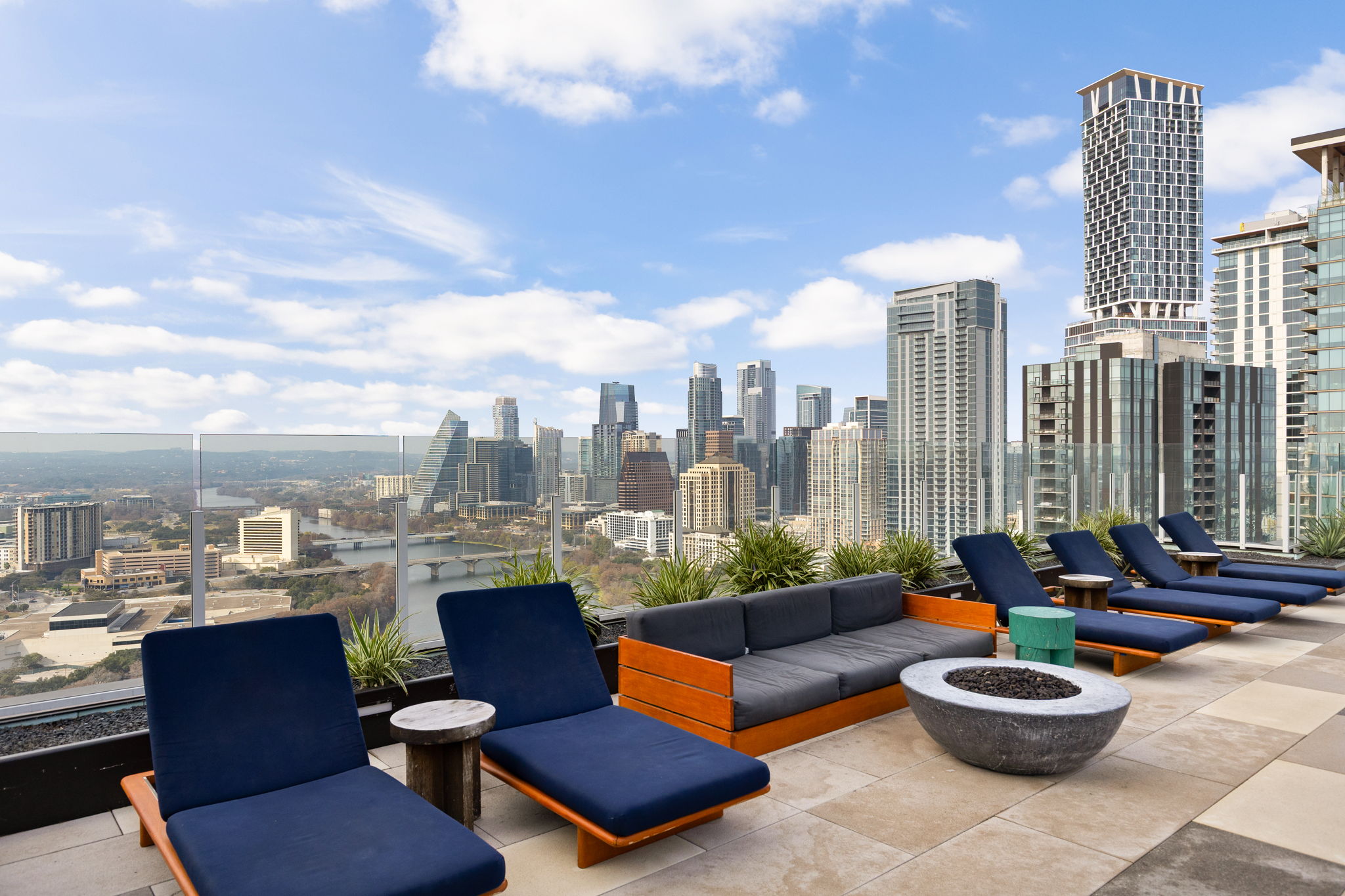 48 East Avenue, Unit 2002 Austin, TX 78701 - Photo 20 of 38 View of patio / terrace featuring a skyline view and an outdoor living space with a fire pit