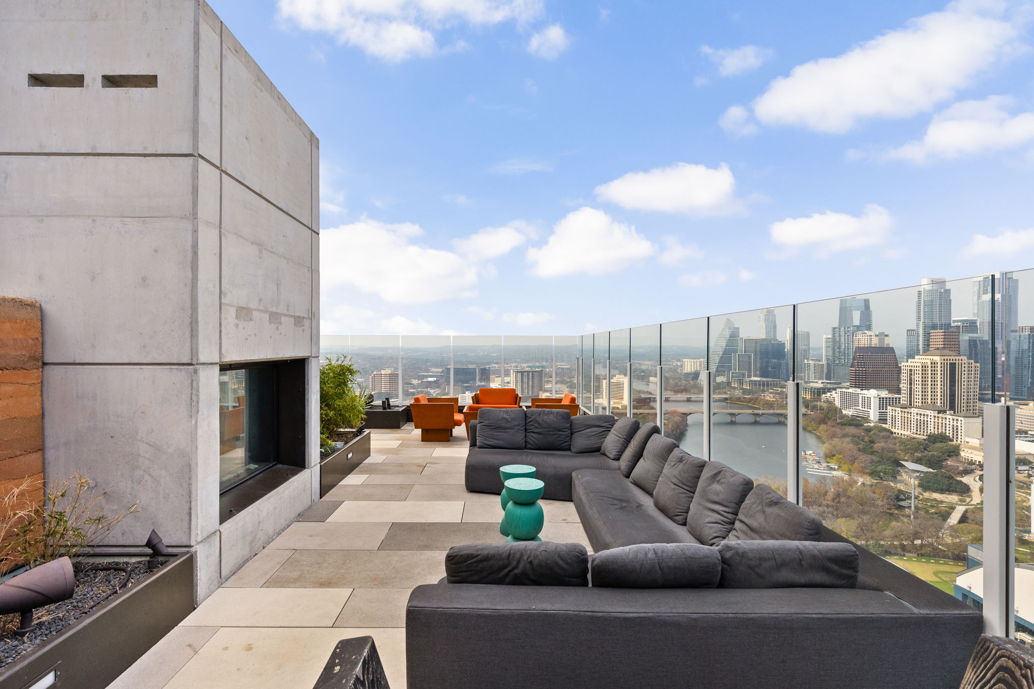 48 East Avenue, Unit 2002 Austin, TX 78701 - Photo 21 of 38 View of patio / terrace featuring an outdoor lounge area, a view of city, and a water view