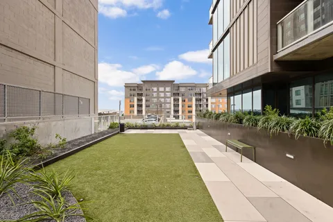 a view of a patio with swimming pool