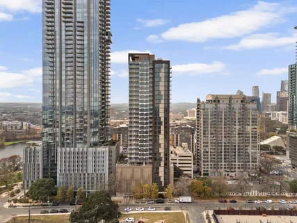 a view of a city with tall buildings