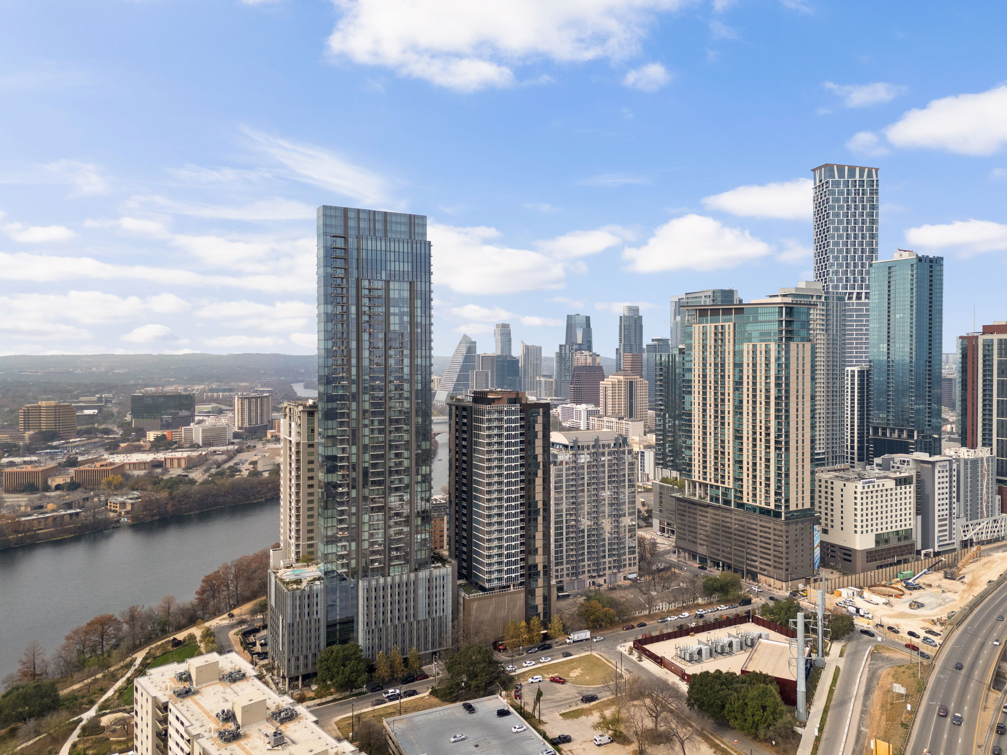 48 East Avenue, Unit 2002 Austin, TX 78701 - Photo 34 of 38 View of city skyline featuring a large body of water