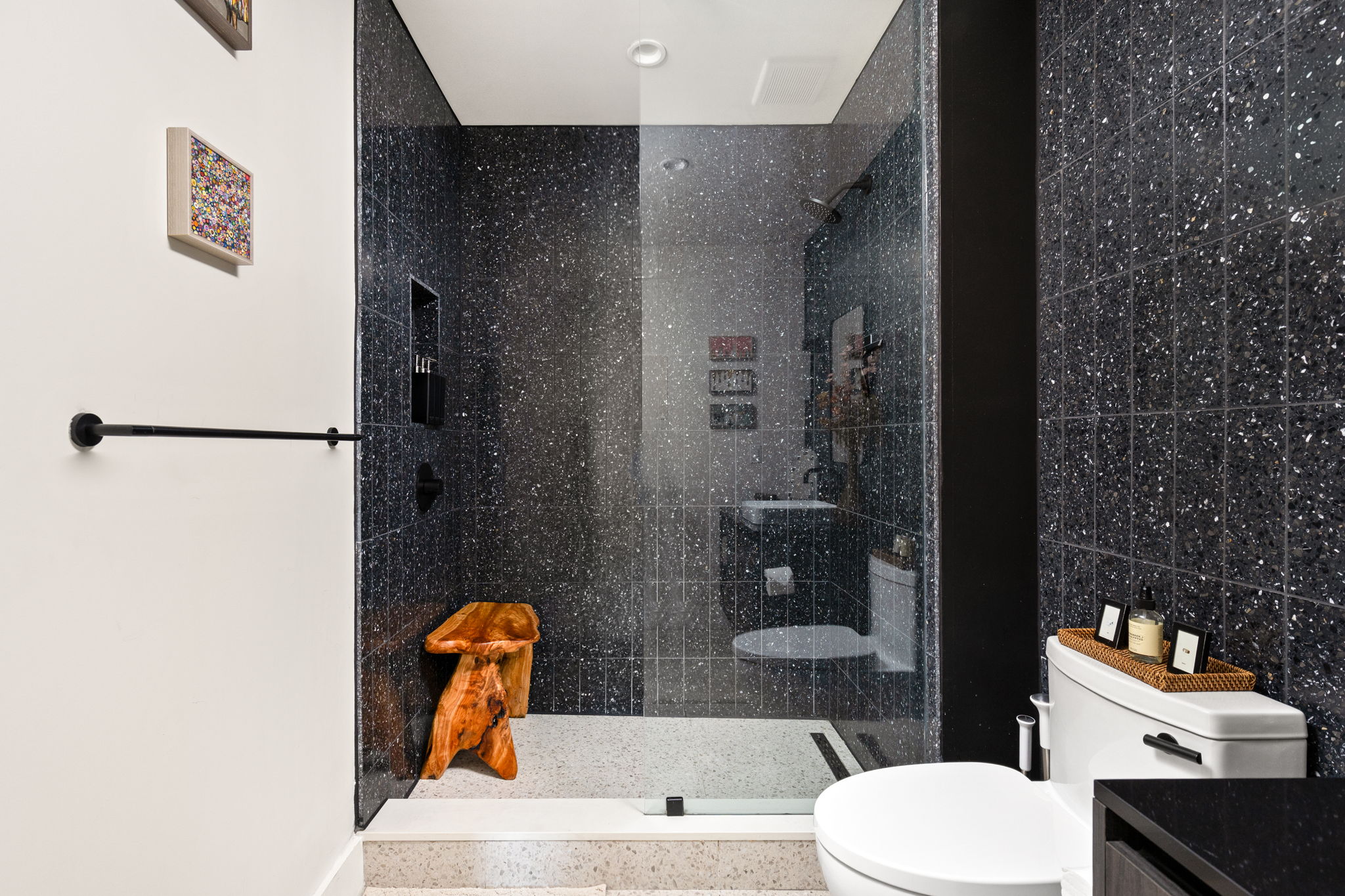 48 East Avenue, Unit 2002 Austin, TX 78701 - Photo 7 of 38 Bathroom featuring a walk in shower, tile walls, and vanity