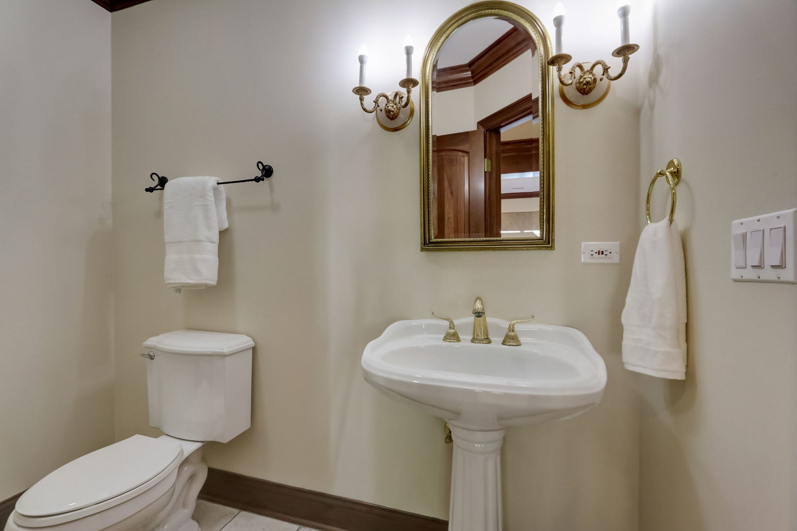 34W226 Country Club Road St. Charles, IL 60174 - Photo 54 of 87 a bathroom with a toilet sink and mirror