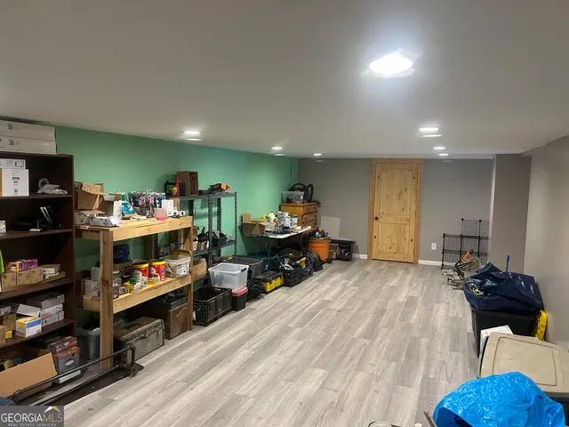 a room with lots of gym equipment