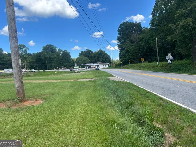 a view of a golf course with a lake view