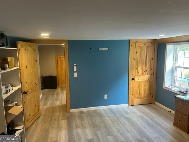 a view of a golf course with a lake