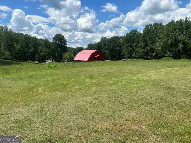 a view of a building with a big yard