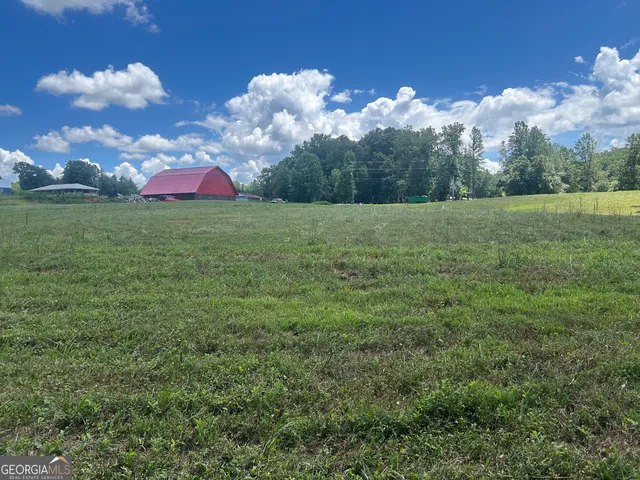 a view of a golf course with a lake