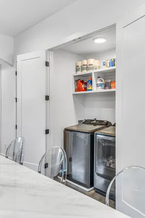 a kitchen with stainless steel appliances granite countertop a stove and a sink
