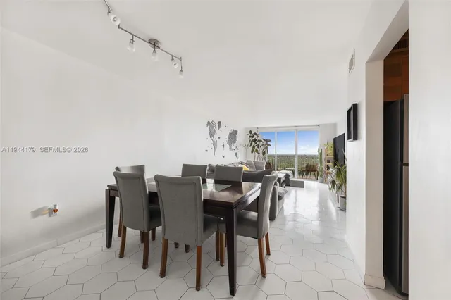 a view of a dining room with furniture
