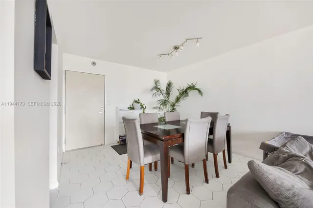 a view of a dining room with furniture