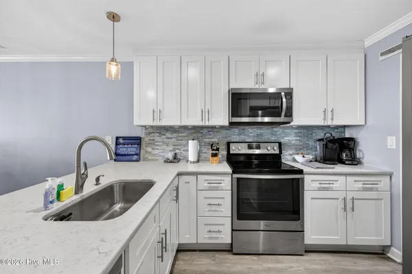 $489,000 | 790 New River Inlet Road, Unit 201B, North Topsail Beach, NC 28460