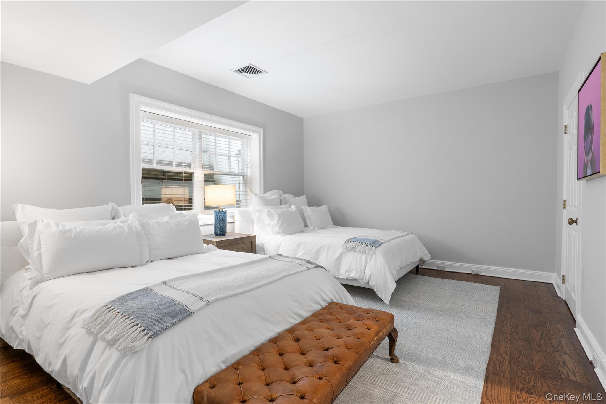 327 Georgica Road East Hampton, NY 11937 - Photo 26 of 36 a bed room with two twin beds in it