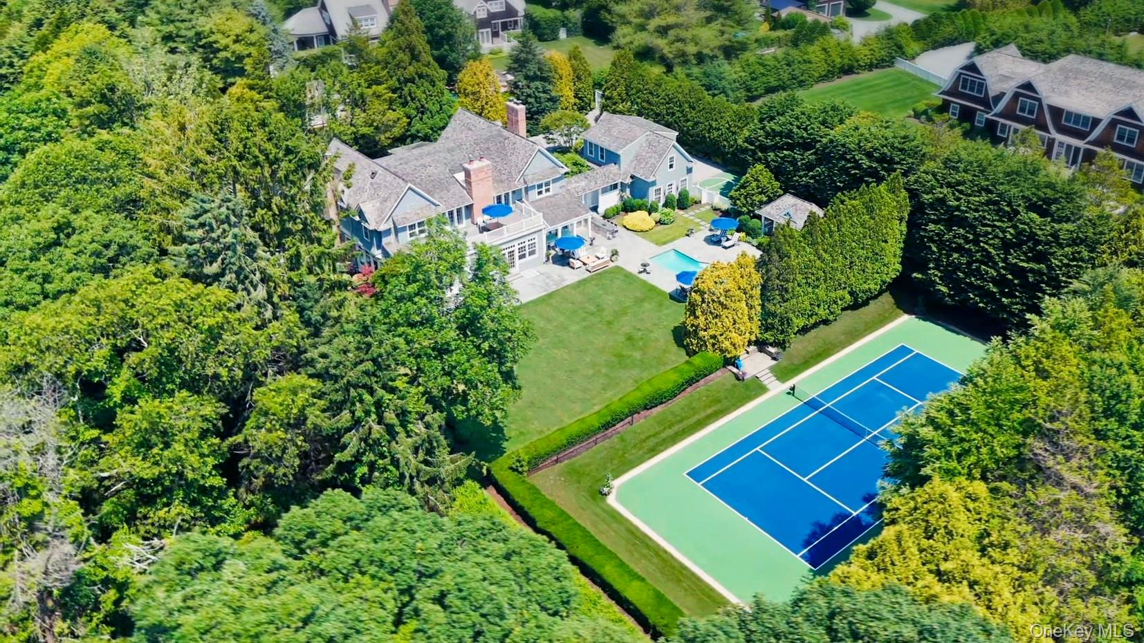 327 Georgica Road East Hampton, NY 11937 - Photo 3 of 36 an aerial view of a tennis ground and outdoor space