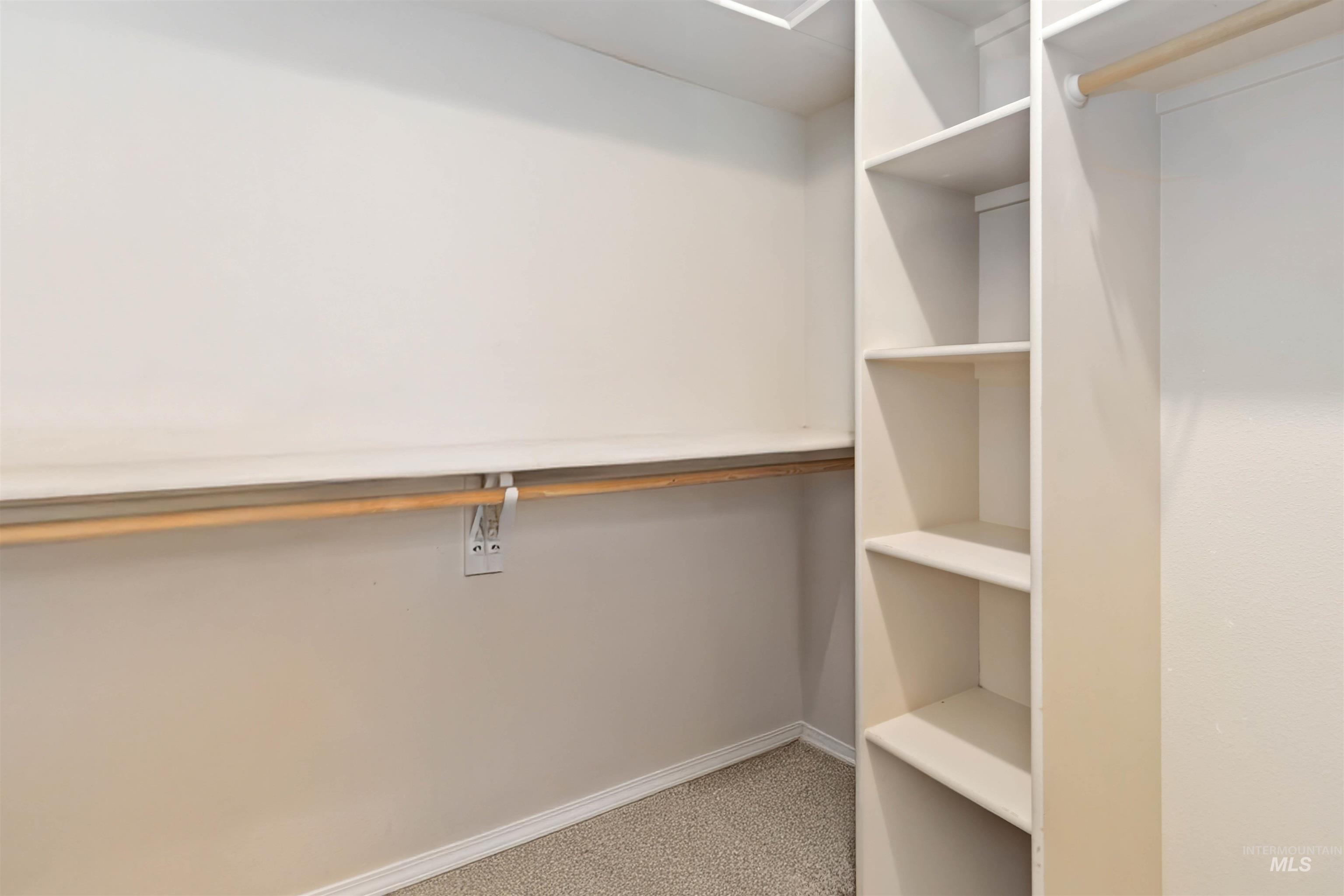16053 Sunnyfield Avenue Caldwell, ID 83607 - Photo 21 of 35 Walk in closet featuring light colored carpet